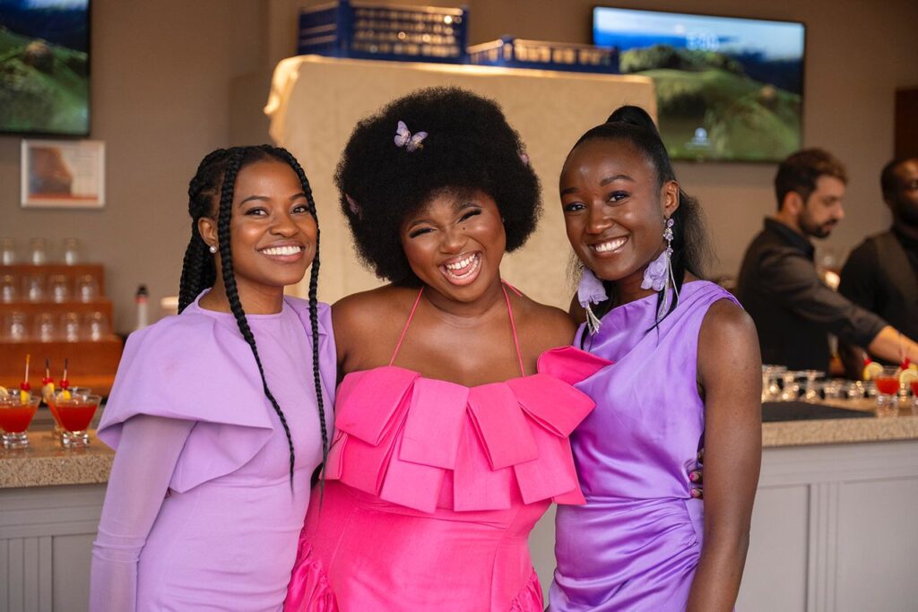 Three beautiful smiling ladies.