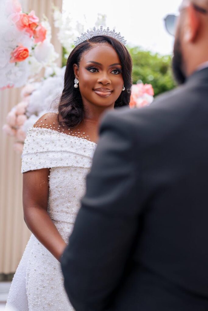 A bride looking at her groom