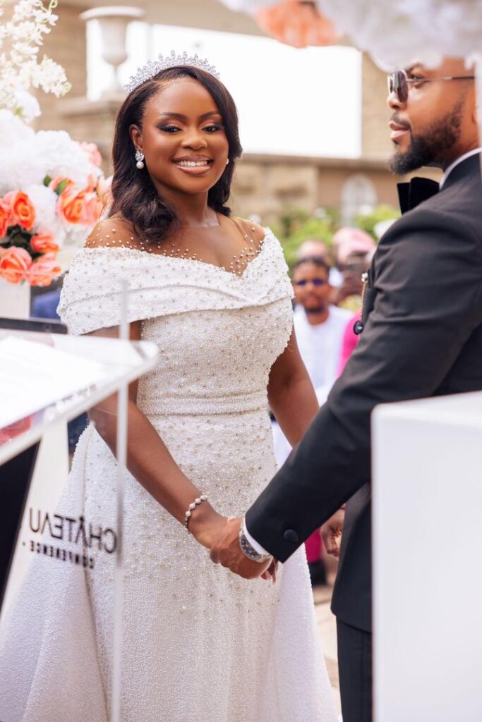A smiling bride during her wedding ceremony.