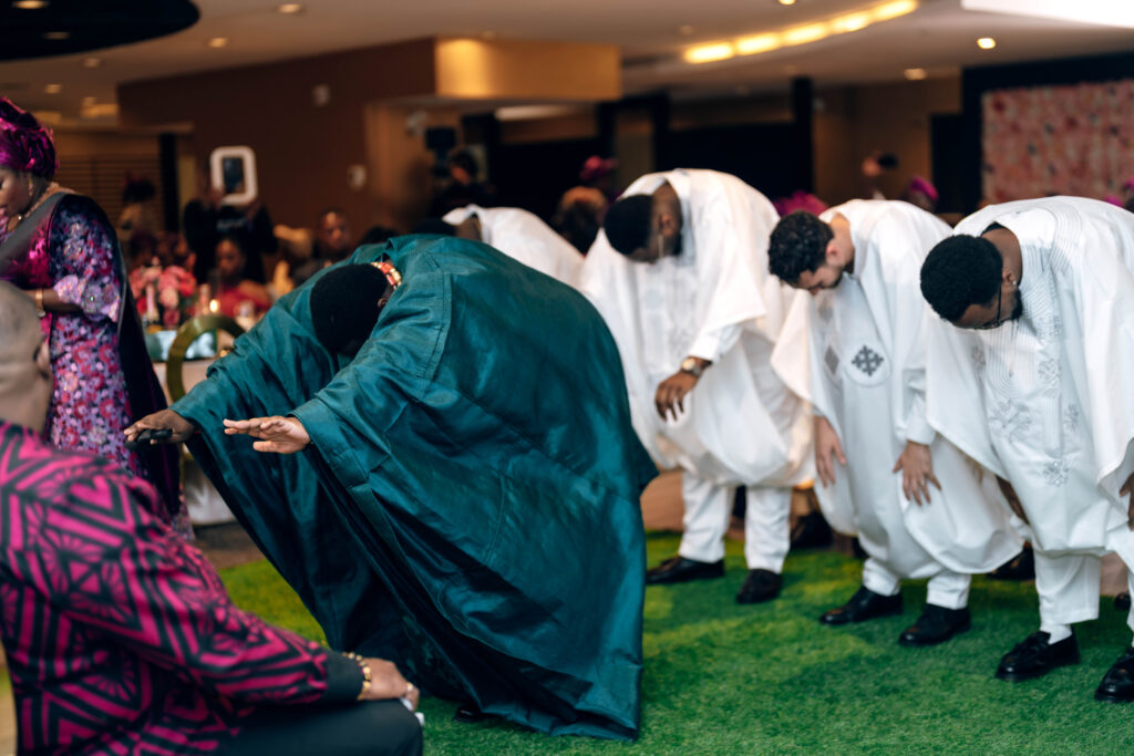 Idobale Yoruba traditional wedding groom prostrates